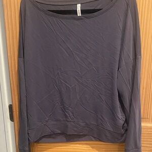 Lightweight long sleeve tunic with wide band bottom edge